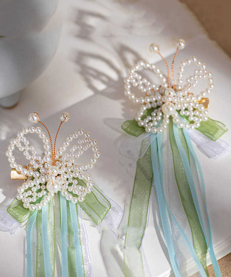 Women's Green Pearl Hair Pin With Pom Pom Ribbon - OutfitLondon