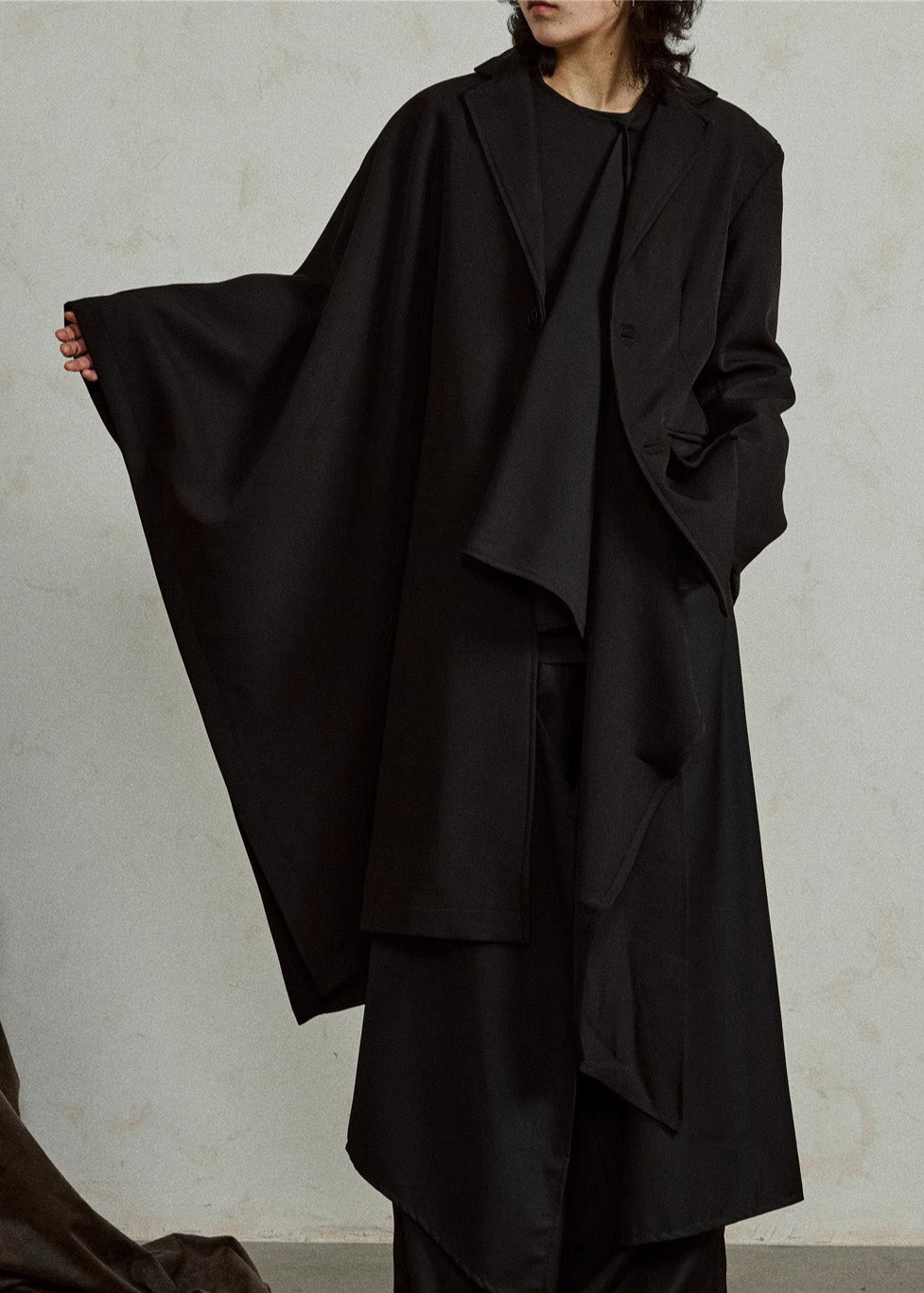 Women's Long Black Coat Cape Sleeves Asymmetrical Pockets - OutfitLondon