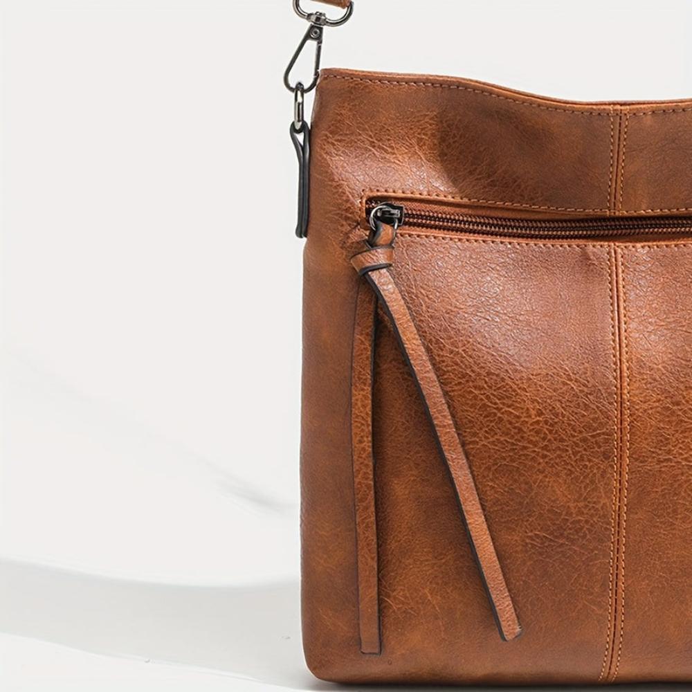 Chic Mini Crossbody Purse with Tassel and Silver Buckle