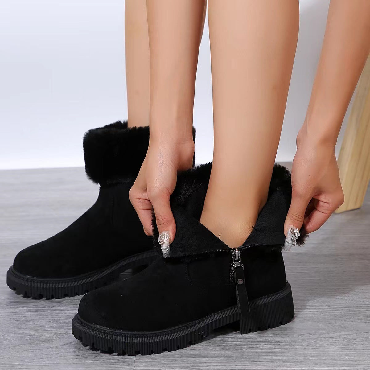 Stylische Knöchelstiefel mit Fellfütterung und dicker Sohle