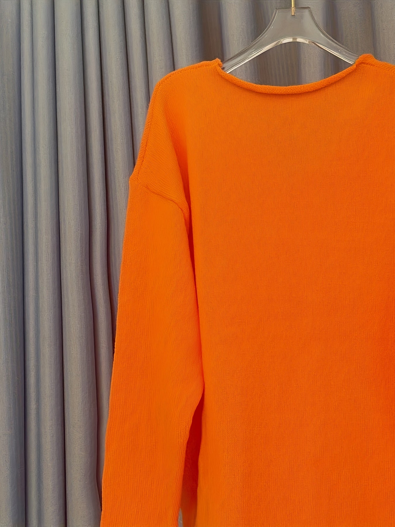 Women's Large V-Neck Sweater with Patterned Design