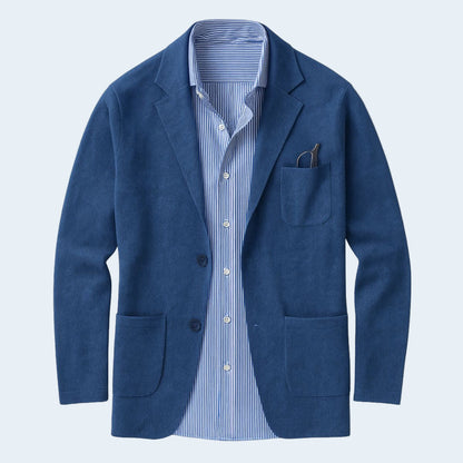 Blue blazer with a striped shirt on a light gray background