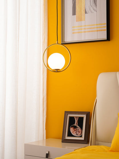 Sleek Glass Pendant Ceiling Light with Brass Accent