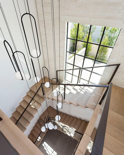 Sleek Glass Pendant Ceiling Light with Brass Accent