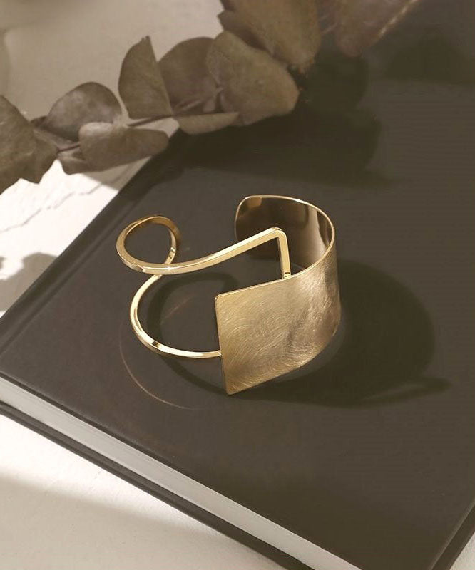 Women's Gold Metal Asymmetrical Cuff Bracelet - OutfitLondon