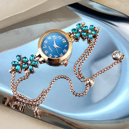Elegantes Armbanduhr mit Schmucksteinen und Pelz