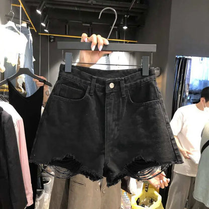 Relaxed Fit Women's Ripped Denim Shorts