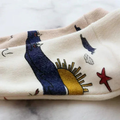Colorful Sweater with Fun Pattern and Button Front
