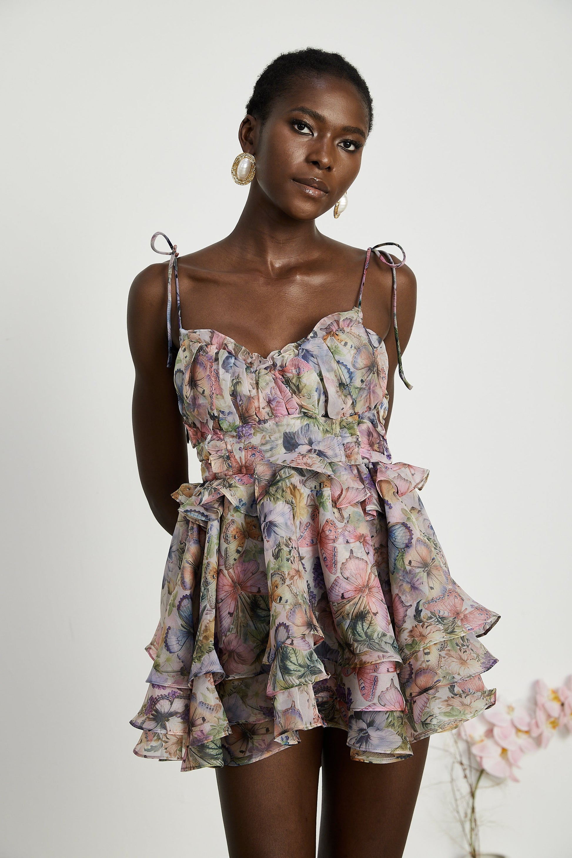 Chic Floral Mini Dress with Pleated Skirt - OutfitLondon